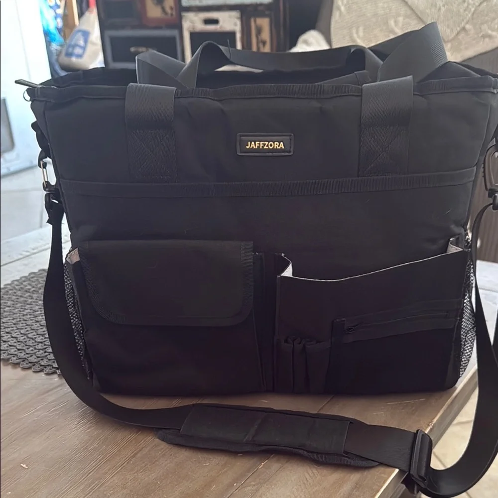 Black LaptopBag with Durable Fabric and Modern Design great for teachers
